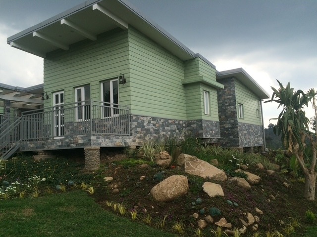 This was built using local labour and as much as possible locally sourced materials and tradesmen. Only one jcb was allowed to be used so that, whilst under construction, we did not scare the primates back into the forest which would have affected the tourism business as well as putting stress on the animals. The lodge units are operated by Rwanda Development Board.