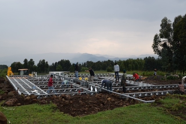 This was built using local labour and as much as possible locally sourced materials and tradesmen. Only one jcb was allowed to be used so that, whilst under construction, we did not scare the primates back into the forest which would have affected the tourism business as well as putting stress on the animals. The lodge units are operated by Rwanda Development Board.